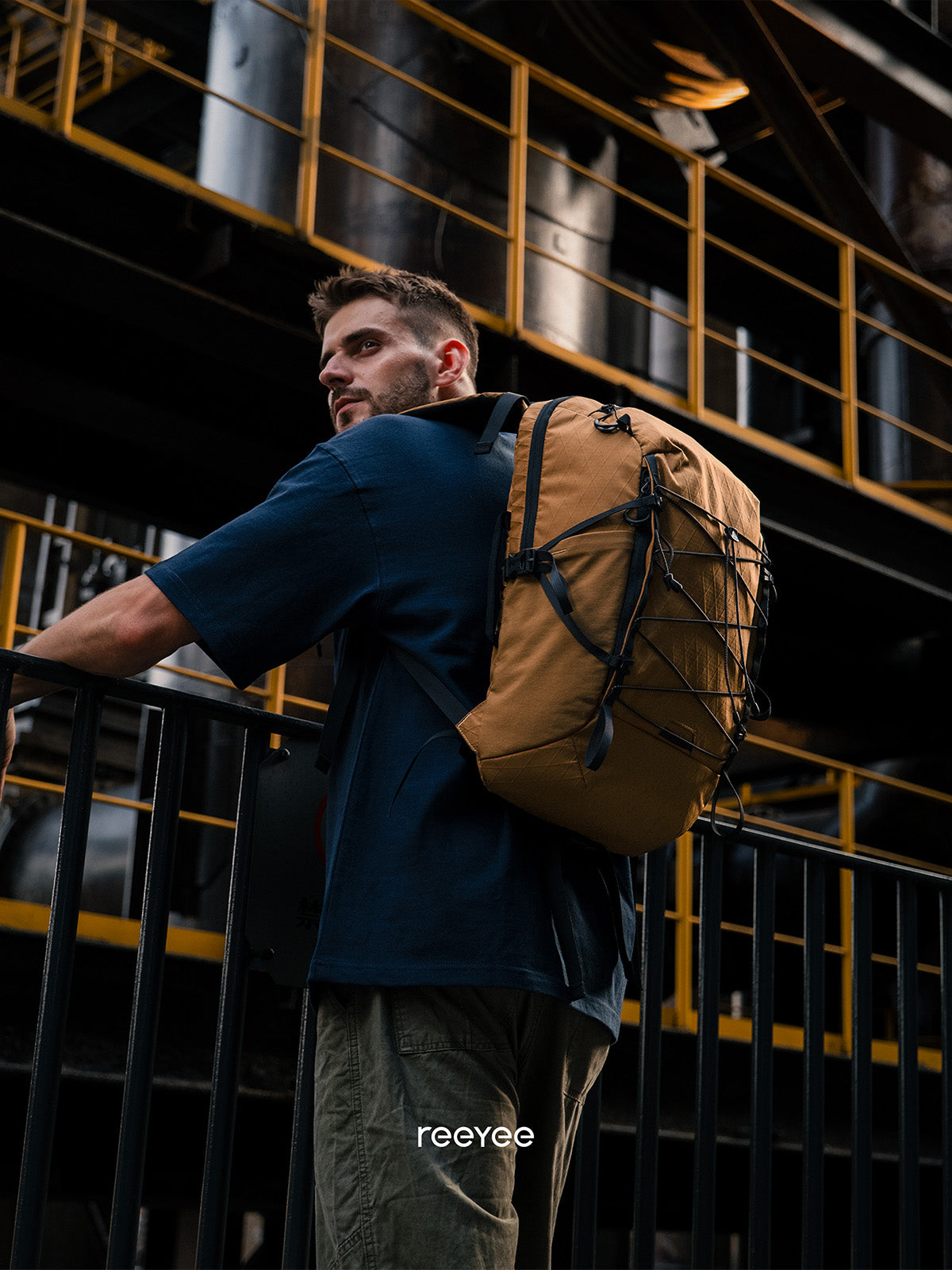 ReeYee A3 26L city-to-trail backpack worn during an urban commute